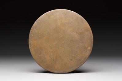 Two Chinese bronze mirrors, one inscribed &lsquo;Fu Shan Shou Hai 福山壽海' and the other with sea animals and grape design, Qing