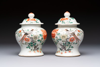 A pair of Chinese famille verte covered jars, a Tieguai Li figure, a blue and white teapot and a biscuit saucer, Kangxi and Qing Yu Tang mark, 19th C.