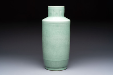 A Chinese celadon-glazed rouleau vase with incised floral design, 18th C.