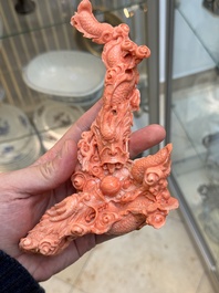 A Chinese carved red coral 'dragon' group, 19/20th C.