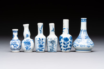 A group of 12 Chinese blue and white miniature vases and a small bottle vase, Kangxi