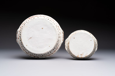 Two reticulated Brussels faience 'A la Haie Fleurie' baskets and a sauce boat, 18th C.