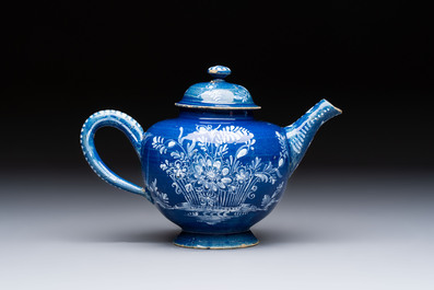 A Nevers white-decorated blue-ground faience teapot and cover, France, 18th C.
