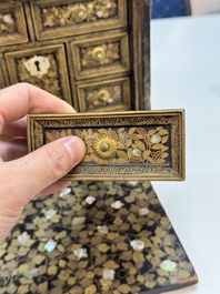 A Japanese Nanban portable lacquer cabinet, Momoyama, late 16th/early 17th C.