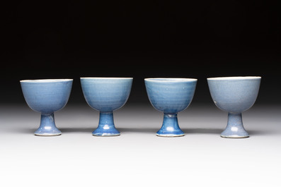 Four Chinese blue-glazed 'Hatcher Cargo' stem cups, Transitional period