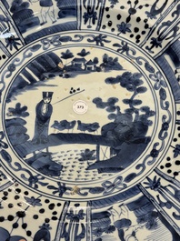 A massive Japanese Arita blue and white 'fisherman' dish, Edo, 17th C.