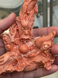 A Chinese carved red coral 'dragon' group, 19/20th C.