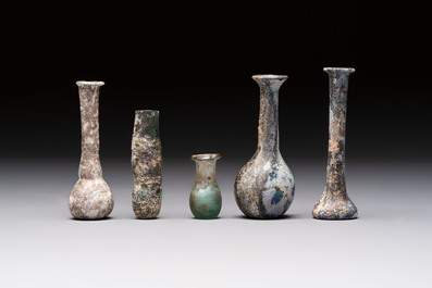 Eight Roman glass flasks, three glass bracelets and two bronze rings, 1st/4th C.