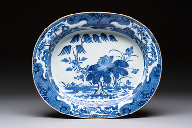 Two Chinese blue and white chargers with floral and landscape design, Qianlong