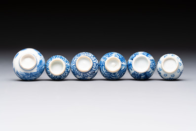 A group of 12 Chinese blue and white miniature vases and a small bottle vase, Kangxi