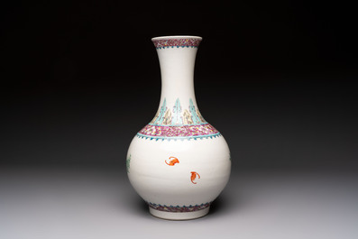 A Chinese famille rose vase with floral design, Hongxian mark and of the period