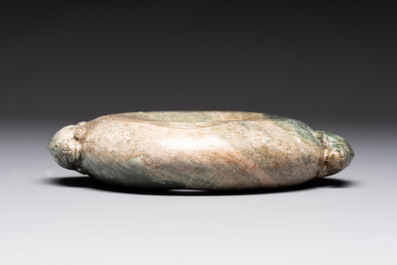 Three Chinese archaistic jade carvings, 20th C.