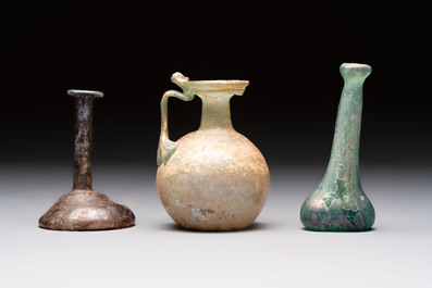 Eight Roman glass flasks, three glass bracelets and two bronze rings, 1st/4th C.