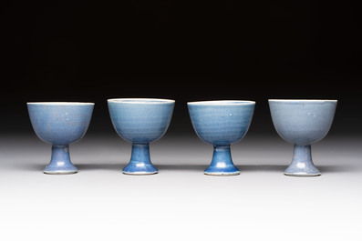 Four Chinese blue-glazed 'Hatcher Cargo' stem cups, Transitional period