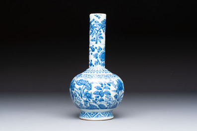 A Chinese blue and white bottle vase with floral design, hare mark, Wanli