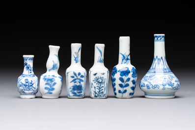 A group of 12 Chinese blue and white miniature vases and a small bottle vase, Kangxi