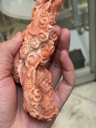 A Chinese carved red coral 'dragon' group, 19/20th C.