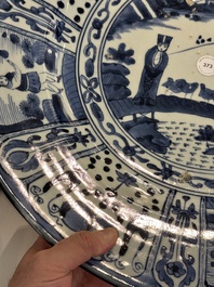 A massive Japanese Arita blue and white 'fisherman' dish, Edo, 17th C.