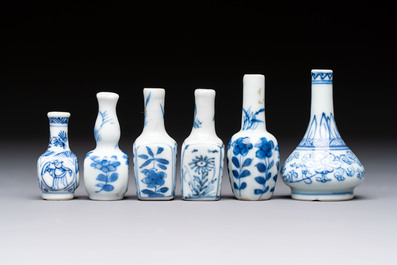 A group of 12 Chinese blue and white miniature vases and a small bottle vase, Kangxi