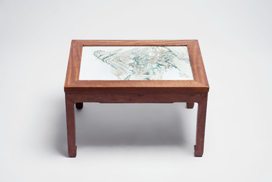 A Chinese qianjiang cai &lsquo;Mountainous Landscape&rsquo; plaque-inset hongmu low table , 19/20th C.