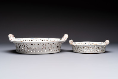 Two reticulated Brussels faience 'A la Haie Fleurie' baskets and a sauce boat, 18th C.