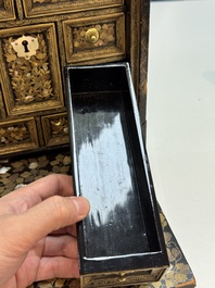 A Japanese Nanban portable lacquer cabinet, Momoyama, late 16th/early 17th C.