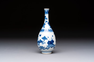 A group of 12 Chinese blue and white miniature vases and a small bottle vase, Kangxi
