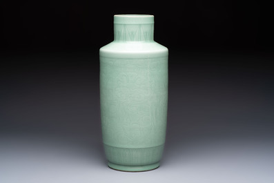 A Chinese celadon-glazed rouleau vase with incised floral design, 18th C.