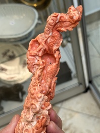 A Chinese carved red coral 'dragon' group, 19/20th C.