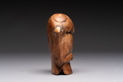 Three Chinese archaistic jade carvings, 20th C.