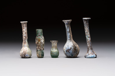 Eight Roman glass flasks, three glass bracelets and two bronze rings, 1st/4th C.