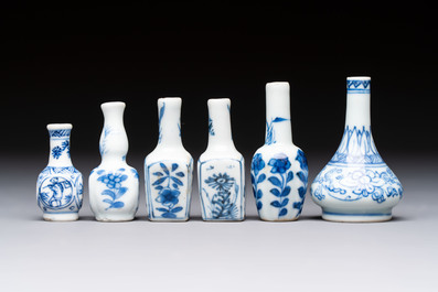 A group of 12 Chinese blue and white miniature vases and a small bottle vase, Kangxi
