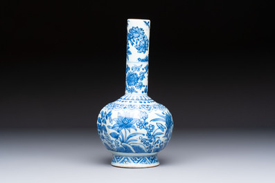 A Chinese blue and white bottle vase with floral design, hare mark, Wanli