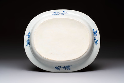 Two Chinese blue and white chargers with floral and landscape design, Qianlong