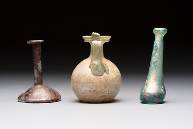 Eight Roman glass flasks, three glass bracelets and two bronze rings, 1st/4th C.