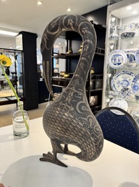 A large Qajar damascened steel bird-form sculpture, Persia, 19th C.