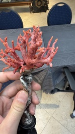 A red coral mounted silver figure, possibly Germany, 19th C.