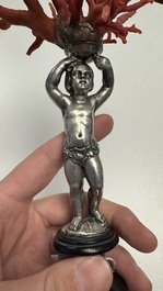A red coral mounted silver figure, possibly Germany, 19th C.