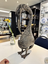 A large Qajar damascened steel bird-form sculpture, Persia, 19th C.