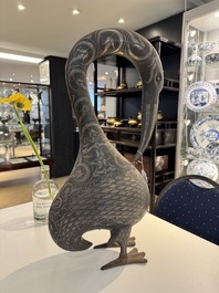 A large Qajar damascened steel bird-form sculpture, Persia, 19th C.