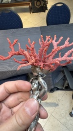 A red coral mounted silver figure, possibly Germany, 19th C.