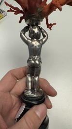 A red coral mounted silver figure, possibly Germany, 19th C.