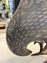 A large Qajar damascened steel bird-form sculpture, Persia, 19th C.