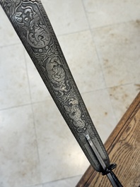 An Indo-Persian steel ceremonial bow or 'arc en acier' with silver koftgari inlay, 18/19th C.