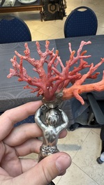A red coral mounted silver figure, possibly Germany, 19th C.