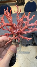 A red coral mounted silver figure, possibly Germany, 19th C.