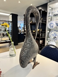 A large Qajar damascened steel bird-form sculpture, Persia, 19th C.