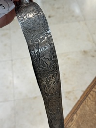 An Indo-Persian steel ceremonial bow or 'arc en acier' with silver koftgari inlay, 18/19th C.