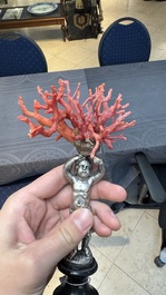 A red coral mounted silver figure, possibly Germany, 19th C.