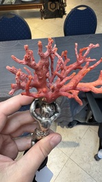 A red coral mounted silver figure, possibly Germany, 19th C.
